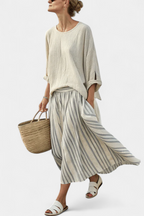 Crisanta | Comfortable blouse and striped midi skirt