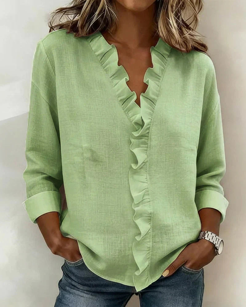 Anora | Blouse à volants et col en V