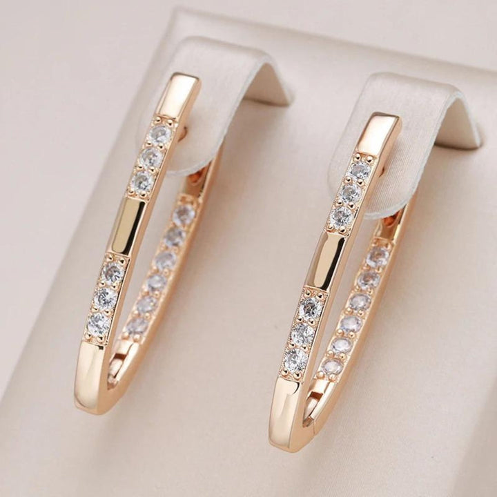 Élégantes boucles d'oreilles en oxyde de zirconium et or