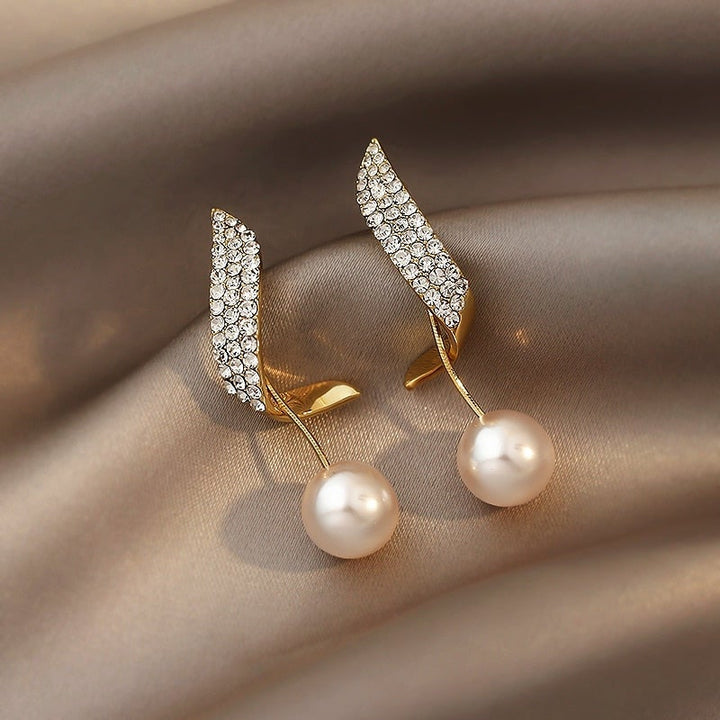Boucles d'oreilles perles et or