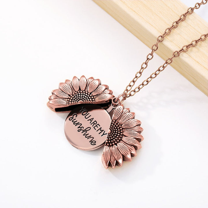 Collier tournesol « Tu es mon rayon de soleil ».