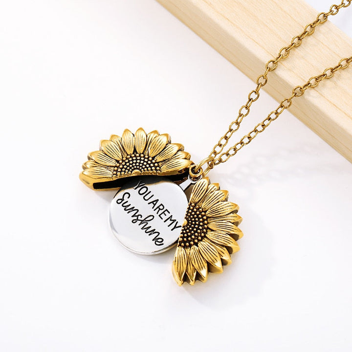 Collier tournesol « Tu es mon rayon de soleil ».