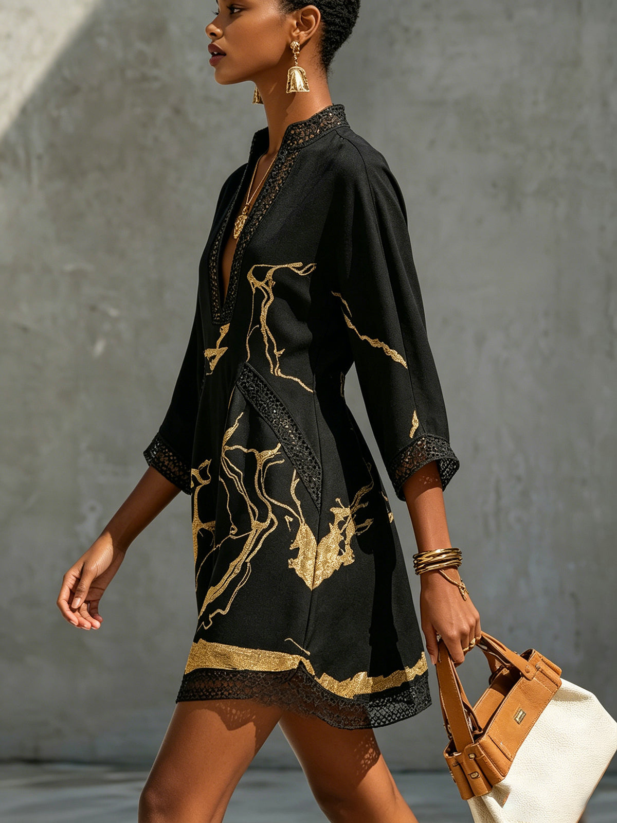 Alissa | Robe mini en crochet noir et or