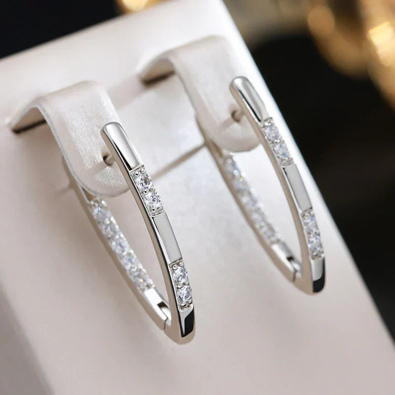 Élégantes boucles d'oreilles en oxyde de zirconium et or