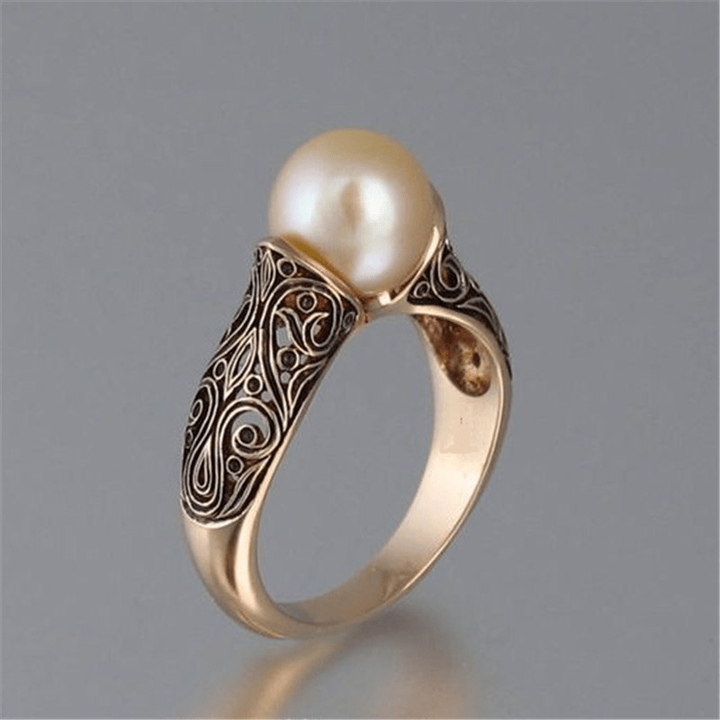Bague vintage en or avec perle